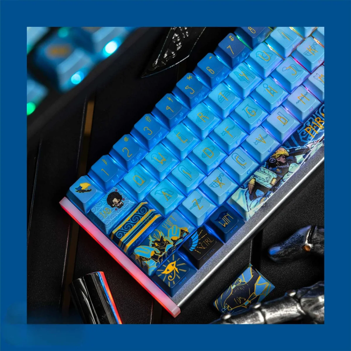 Gallery view of the premium Overwatch Pharah PBT keycap, showcasing its side-engraved art and unique metallic paint accents from various angles.