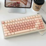 The Sea Salt Milk Jelly keycaps, from the Pastel Pudding Jelly Keycap Set, feature translucent seafoam blue for a sweet, playful desk.