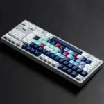 MONTAGE Dye-Sub PBT Cherry Keycaps. Durable PBT, crisp legends. Multiple angles highlight a sleek, sophisticated industrial design.