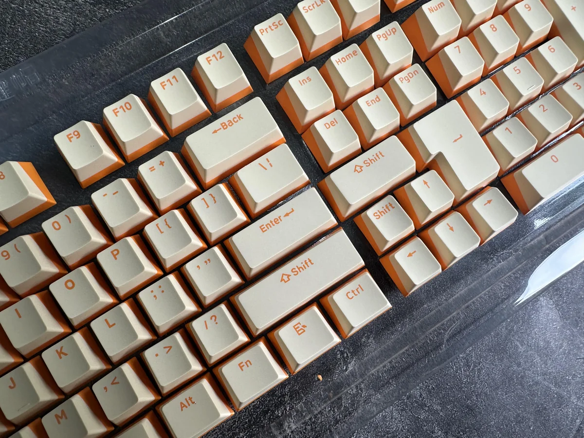 Custard Yellow PBT Double-Shot Keycaps, many angles. Highlights durable PBT, warm dual-tone, and crisp double-shot legends.