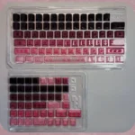 High-transparency PC gradient keycaps in a sleek black-pink transition, showcasing a modern, front-engraved design ideal for vibrant RGB illumination.