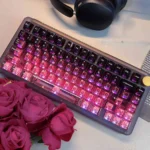 Stunning PC gradient keycaps in black-pink, showcasing high-transparency for vibrant RGB lighting. Elevate your keyboard with this sleek, modern aesthetic.