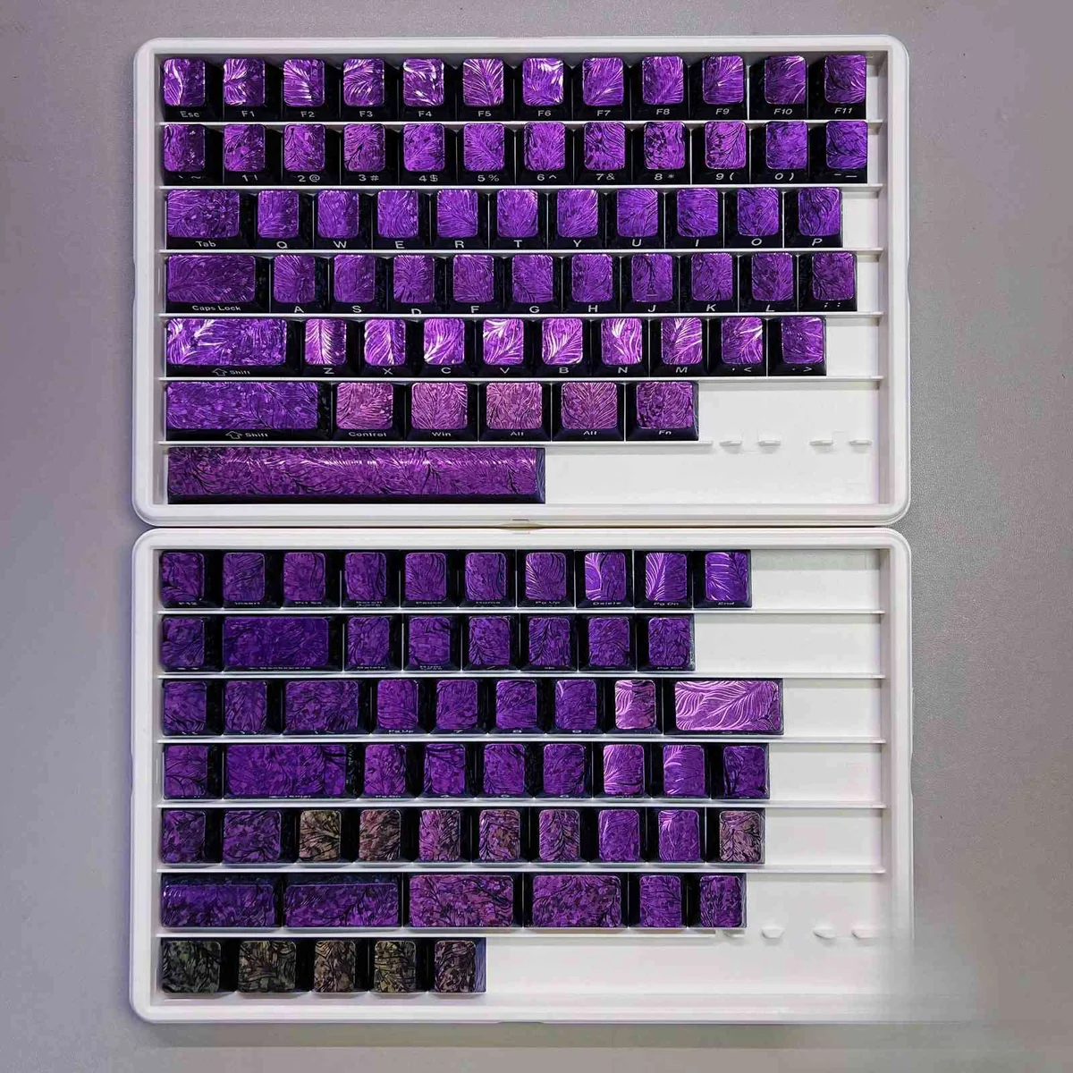 Peacock Keycap Set, showcasing exquisite side-engraved legends and iridescent feather art. Multiple angles highlight intricate artistic patterns.