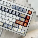 Apollo Keycap Set displayed from multiple angles, showcasing the divine metallic PBT finish and translucent PC glow, embodying its radiant mythical.