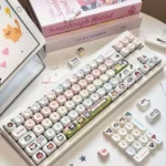 A captivating display of Pixel Paradise Jade Keycaps, revealing their unique jade-like resin texture and vibrant retro pixel art aesthetic.