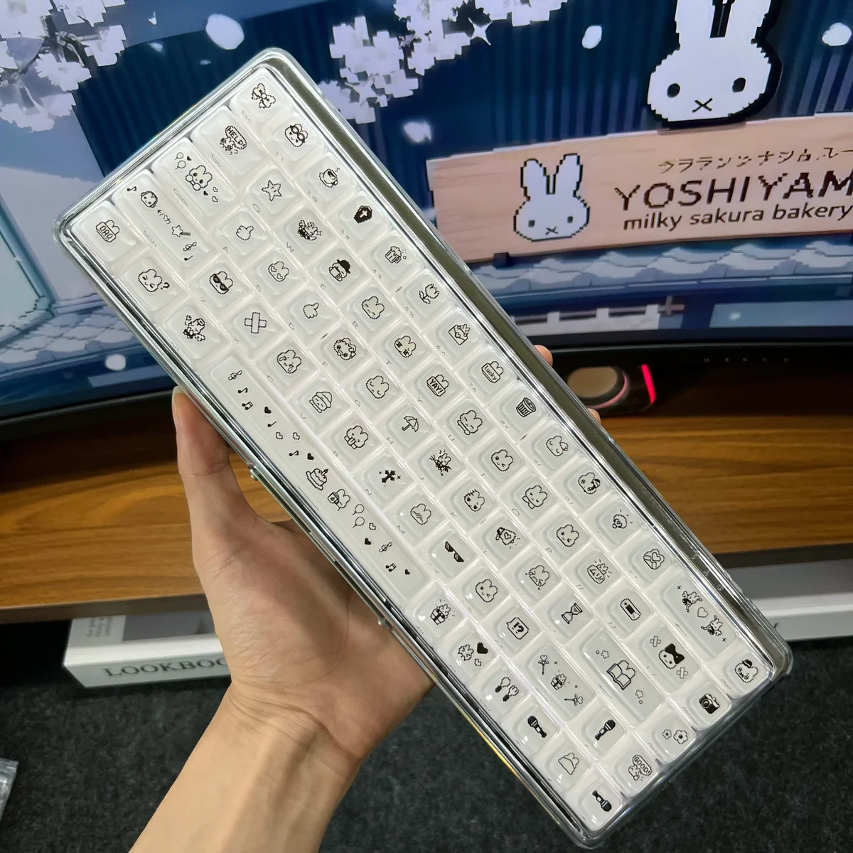 Playful Pixel Rabbit Keycaps in translucent jelly MDA profile, featuring cute pixel art rabbits from multiple angles.
