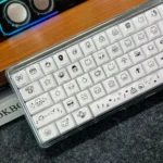 Pixel Rabbit Keycaps: translucent jelly MDA set shown from different angles, highlighting the cute pixel art rabbit, vibrant colors.
