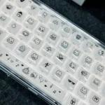 Playful Pixel Rabbit Keycaps: translucent jelly MDA set, shown from various angles. Cute custom keycaps with vibrant pixel art rabbits.