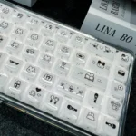 Pixel Rabbit Keycaps: Translucent Jelly MDA Set. Gallery of cute pixel art rabbits on vibrant, clear keycaps from all angles, emphasizing playful design.