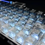 Multiple angles of the Polar Day Carbon Fiber Keycap, showcasing its sleek, high-contrast pattern and unique ethereal glow.