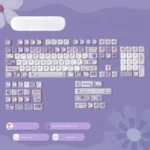 A close-up view of the Dreamy PBT Purple Mist MOA Keycap Set, showcasing the ethereal purple gradients and soft, tranquil design from a unique angle.