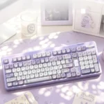 Dreamy PBT Purple Mist MOA Keycap Set, featuring ethereal purple gradients on a serene keyboard, enhancing a tranquil typing experience.