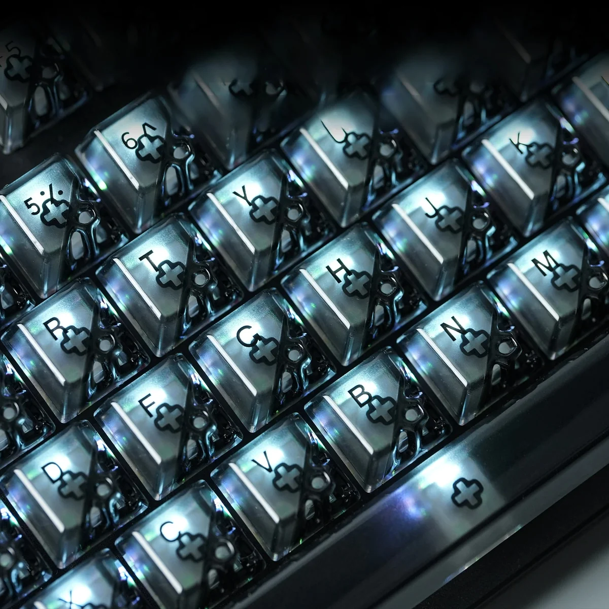Gallery view of Quantum Hive Lite Keycaps, highlighting their translucent PC, futuristic geometric design, and vibrant full RGB illumination from variant angles.