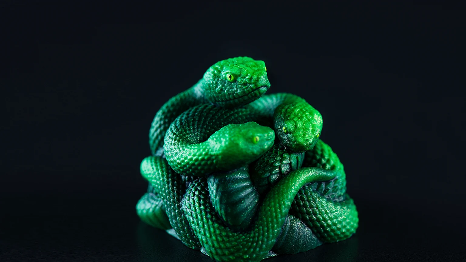 Close-up of the hand-painted Razer Triple-Headed Snake artisan keycap