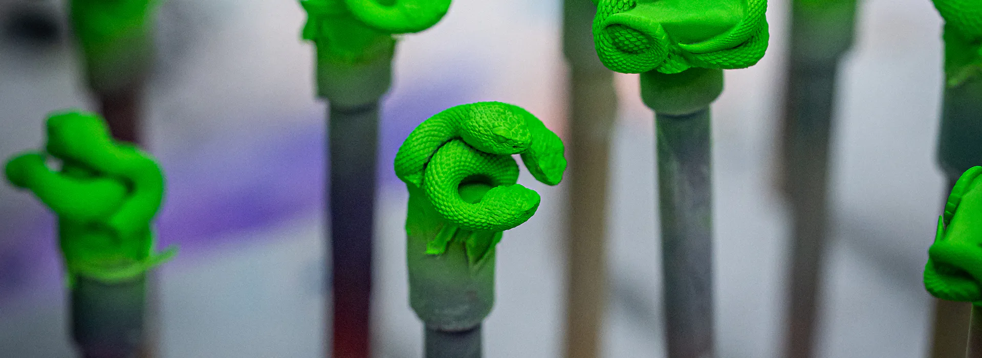 Green Razer Triple-Headed Snake keycap sculpts during resin casting