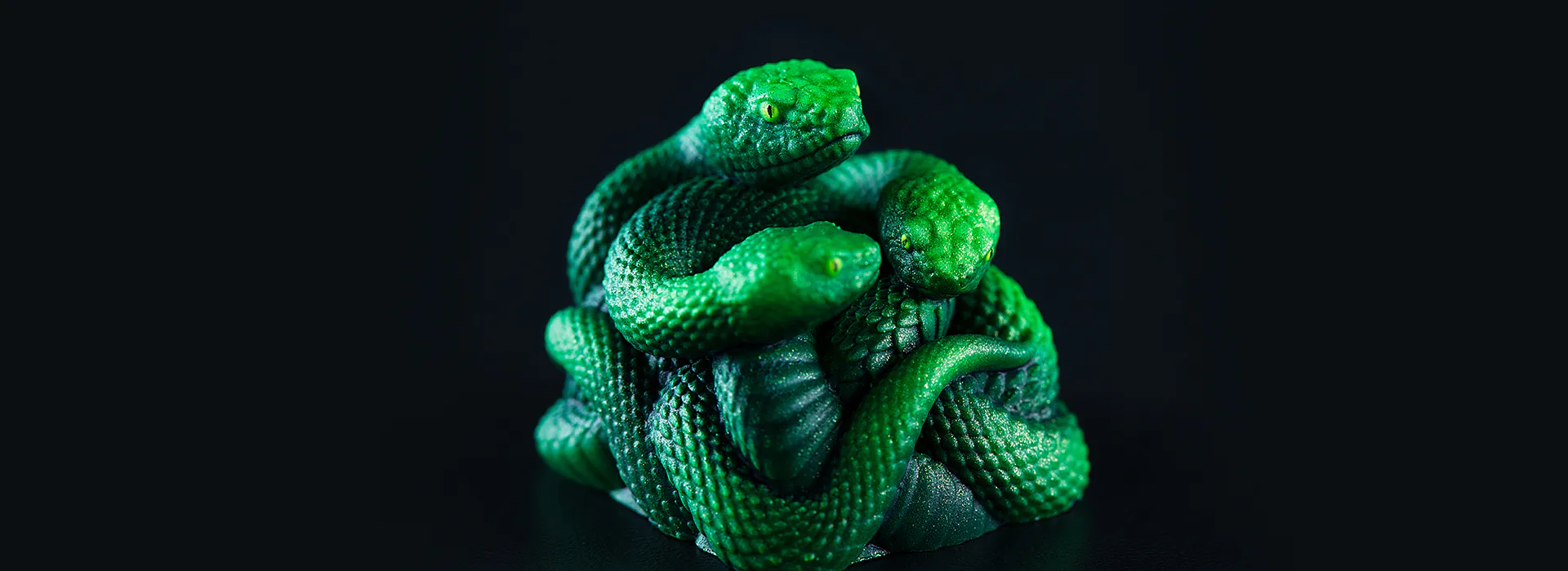 Finished Razer Triple-Headed Snake artisan keycap under quality inspection
