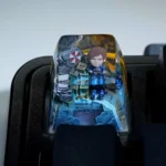 Angled view of the iconic Resident Evil Leon Scott Kennedy artisan keycap, highlighting detailed resin artistry and high transparency. Captures Leon Kennedy's aesthetics.