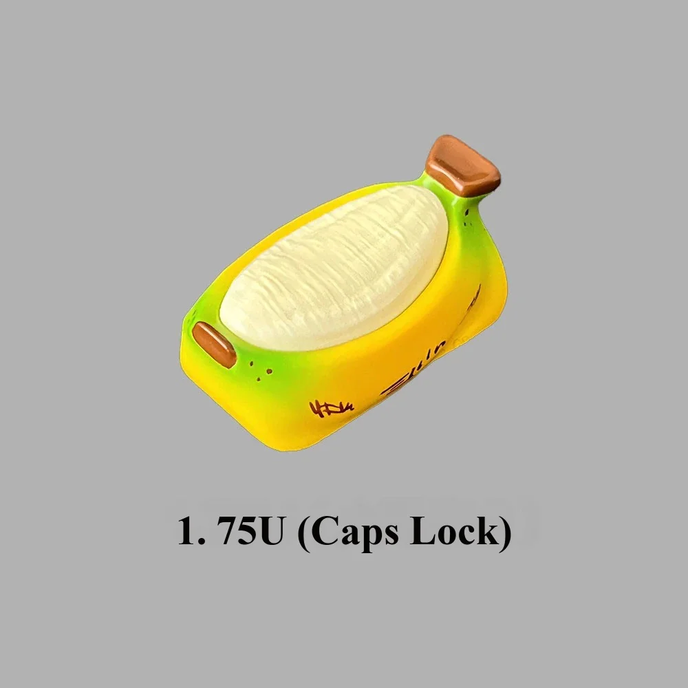 This unique, hand-painted chubby banana resin artisan keycap, vibrantly colored and handcrafted, is shown from a cheerful angle.