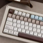 Coco Duck Cherry Keycap Set from multiple angles, showcasing the warm aesthetic with charming duck illustrations for an artistic keyboard.