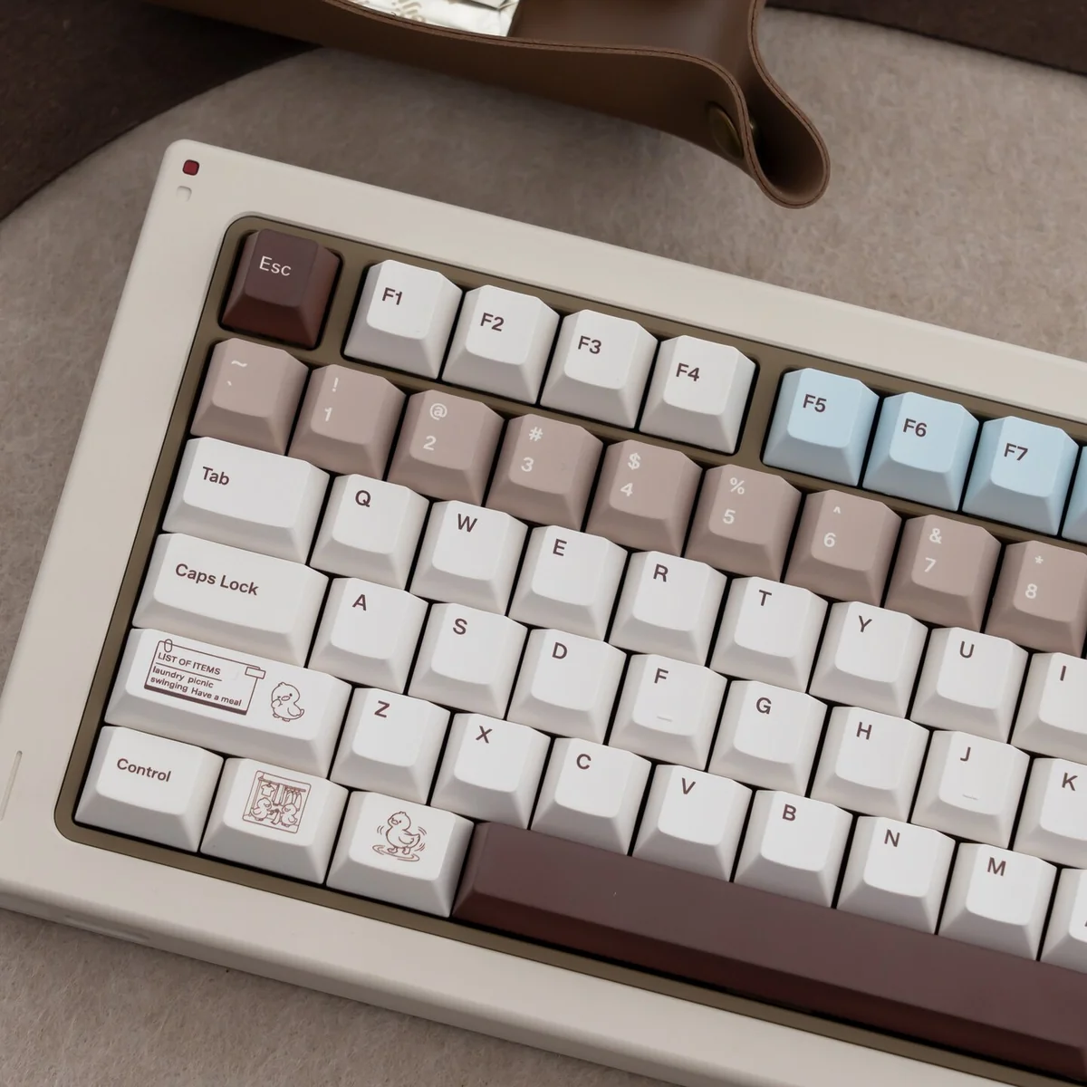 Coco Duck Cherry Keycap Set from multiple angles, showcasing the warm aesthetic with charming duck illustrations for an artistic keyboard.