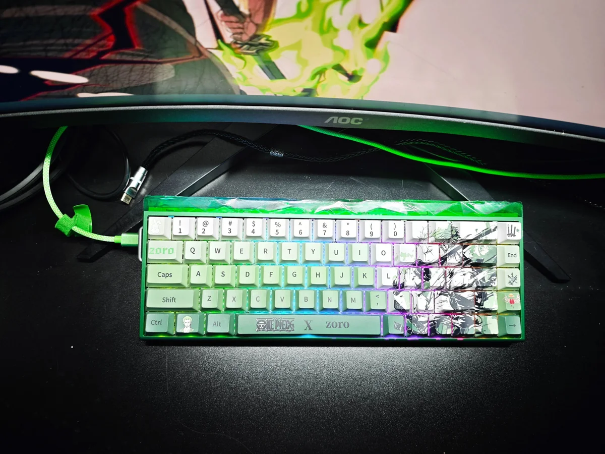 Exclusive Zoro Keycap Set gallery showcasing premium PBT dye-sub keycaps with iconic One Piece Zoro imagery, samurai motifs, and vibrant green accent.