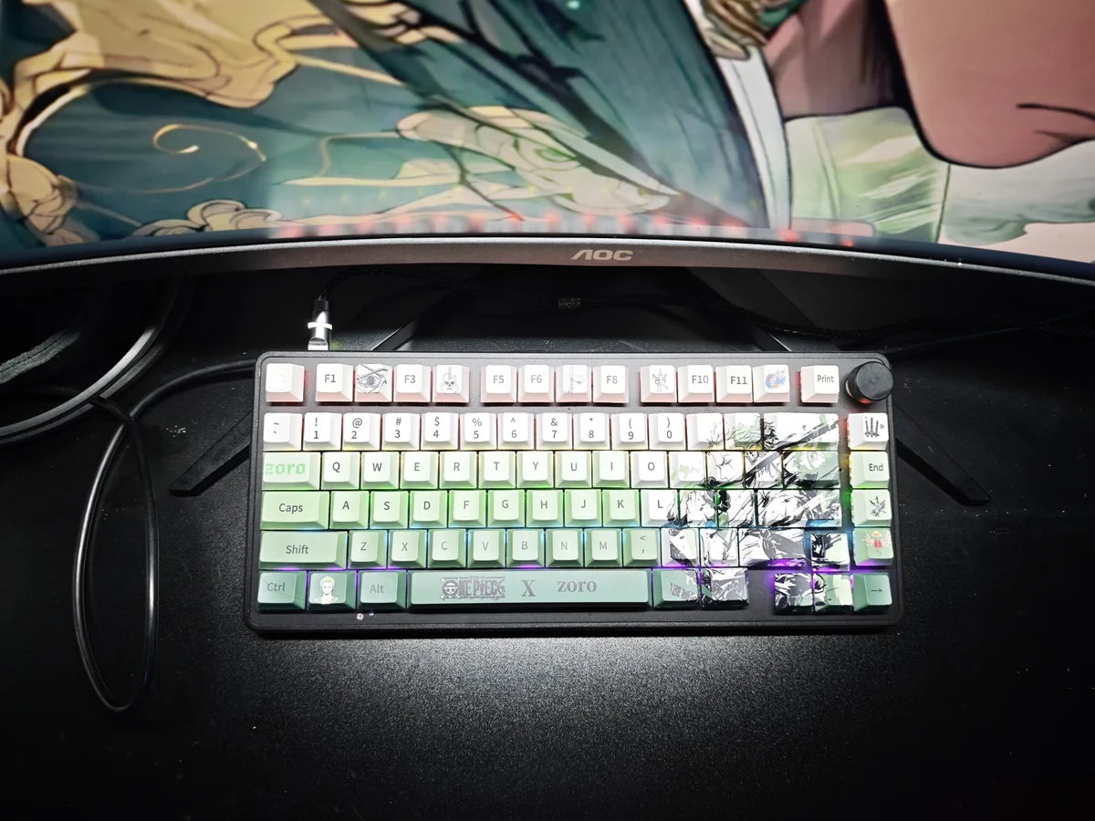 Exclusive One Piece Zoro PBT Dye-Sub mechanical keycap set, showcasing iconic samurai motifs and vibrant green accents from various angles.