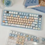 Charming Sailor Bear MOA Keycap Set, a whimsical keycap featuring a delightful bear in a sailor hat and playful ocean hues for your desk.