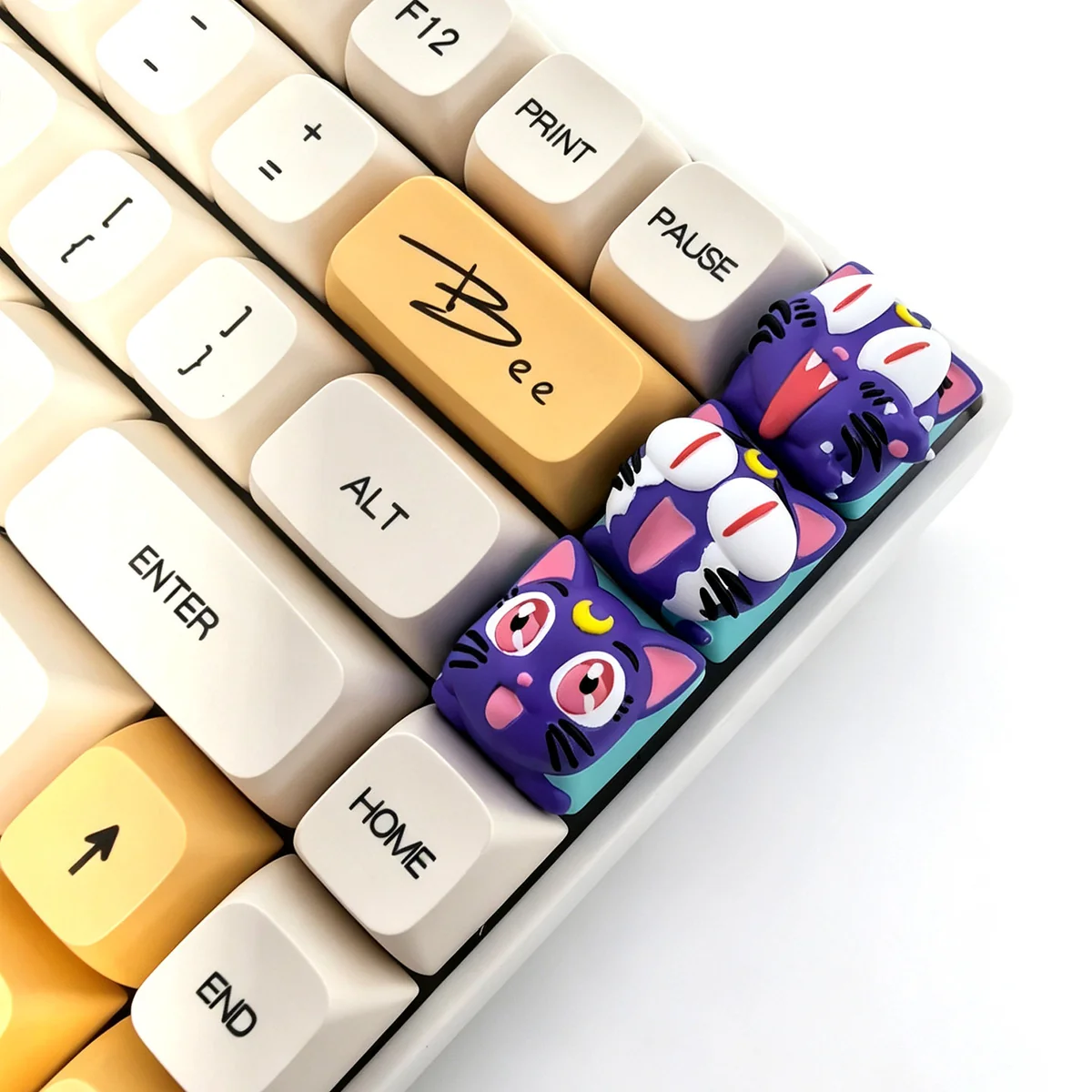 A close-up, artistic view of the handcrafted 3D resin Sailor Moon Luna keycap, showcasing its intricate details and whimsical anime design from a unique carftmanship.