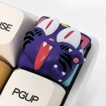 Dynamic angled shot of the handcrafted 3D resin Sailor Moon Luna keycap, highlighting the whimsical anime character's vibrant colors and unique craftmanship.