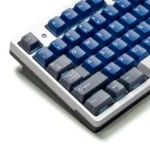 Striking Samurai Blue translucent double-shot keycaps set, shown from a distinct angle, reveal their deep blue luminosity and premium quality for any mechanical keyboard.