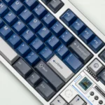 A premium Samurai Blue translucent double-shot keycap set, artfully displayed from a unique angle. Highlights deep, striking color and subtle design.