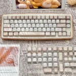 Unique 120-key Cherry profile Siamese Cat Azukisan PBT keycaps set, featuring earthy tones and playful cat motifs for a cozy keyboard aesthetic.