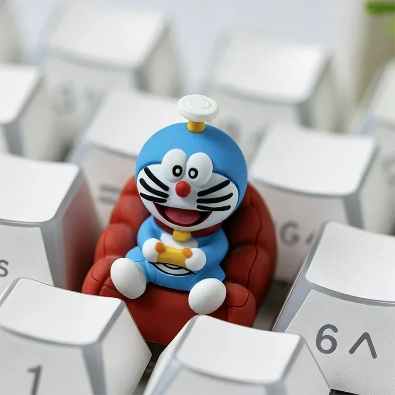 A detailed side view of the whimsical handcrafted Doraemon resin ESC keycap, showcasing its vibrant blue and white design and intricate craftsmanship.