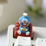 Handcrafted Doraemon resin ESC keycap, vibrant blue and white, showcasing whimsical detail for nostalgic fun on any keyboard.