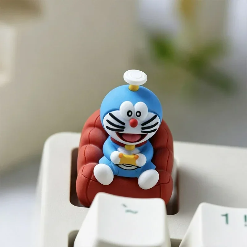 Handcrafted Doraemon resin ESC keycap, vibrant blue and white, showcasing whimsical detail for nostalgic fun on any keyboard.