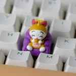 Side angle of the nostalgic Dorami ESC keycap, revealing the intricate details of this vibrant, handcrafted artisan collectible.