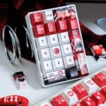Artistic product gallery view of the iconic Slam Dunk PBT keycap set, showcasing vibrant anime characters and basketball court designs.