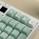 Song Matte Translucent ABS Cherry keycaps, smooth matte finish, showcased from multiple angles, emphasizing the subtle diffused light."