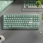 Song Matte Translucent ABS Cherry Keycaps showcasing their matte semi-transparent profile, offering a subtle, diffused light aesthetic for sophisticated setups.