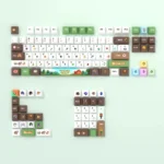 Close-up of authentic Stardew Valley pixel art PBT dye-sub translucent keycaps, showcasing vibrant farm life designs from multiple angles.
