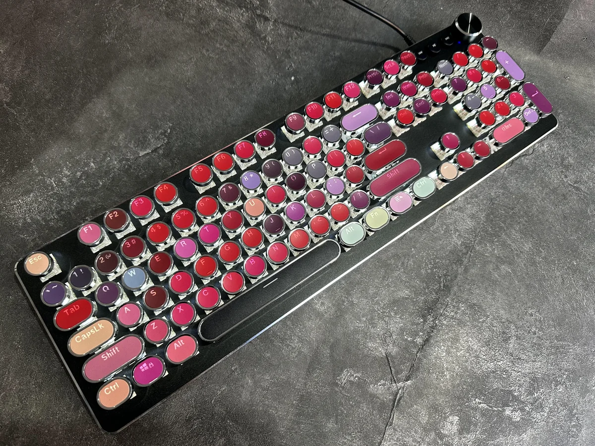 Main display of the Daring Lipstick Steampunk Mechanical Keyboard, showcasing its vibrant, glossy, retro-futuristic design with bold lipstick.