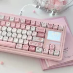 Playful Sugar Bunnies MOA PBT keycap set showcasing various adorable keys from different angles, all with a whimsical pastel dessert theme.