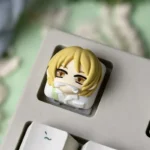Gallery views of the exclusive handcrafted Natsume keycap, highlighting its charming anime characters and meticulously sculpted resin. A delicate design.