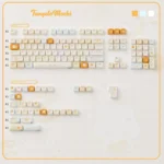Vibrant Tangelo Mochi PBT dye-sub keycaps, shown from various playful angles, highlighting the unique dessert-inspired design in orange and cream.