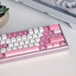 The Fox's Wedding PBT dye-sub keycaps, shown from various angles, featuring soft pinks and mystical fox motifs with a traditional East Asian aesthetics keyboard.