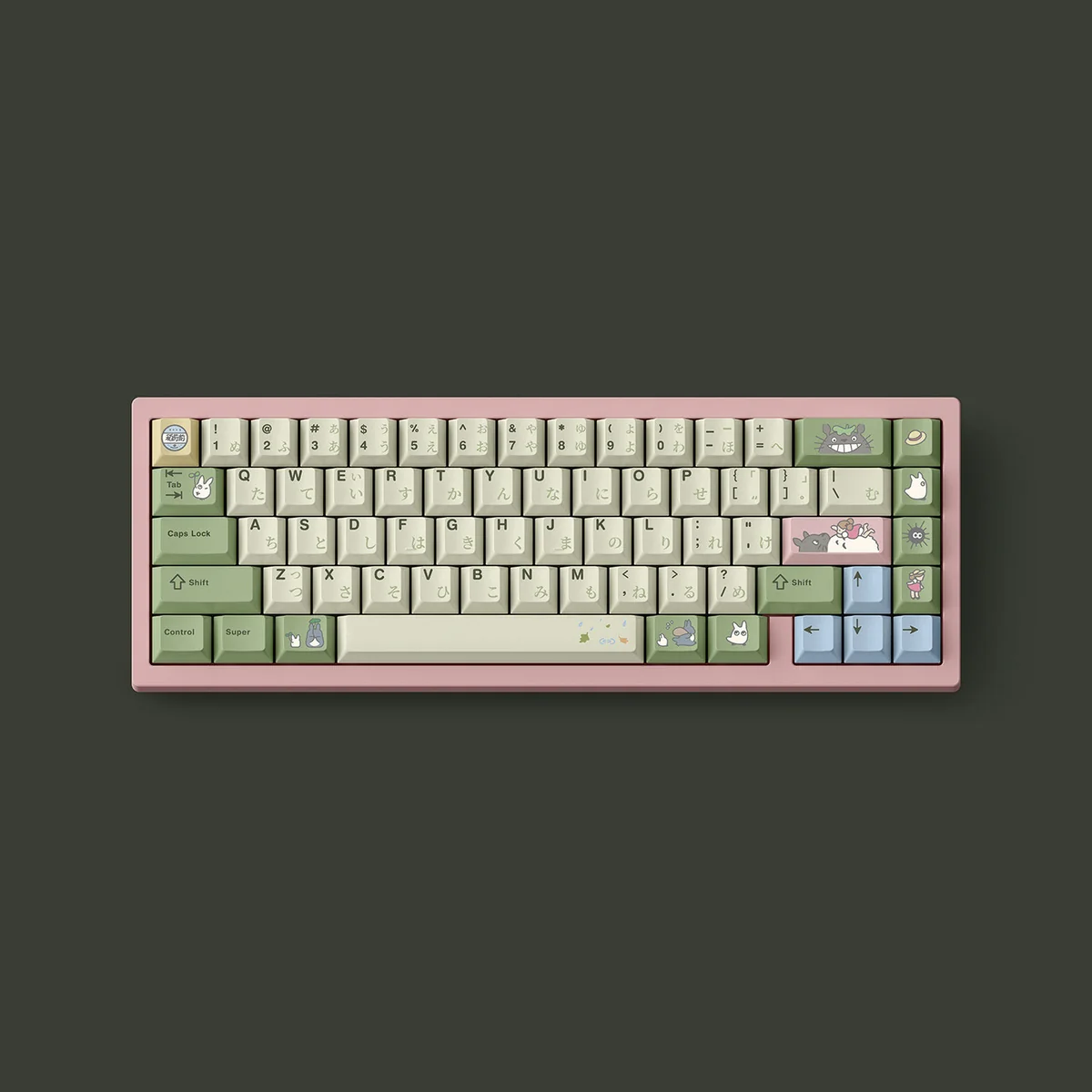 Exclusive Totoro PBT dye-sub keycaps featuring iconic forest spirits from various angles in a soothing palette for nostalgic desks.