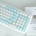 A playful cat paradise mechanical keyboard gallery showcasing its charming feline design from various angles, featuring soft, inviting colors.