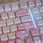 UR98 Spring Kitten Tri-Mode Mechanical Keyboard: whimsical pastel design, white base, silent linear switches, multiple views. Tri-mode connectivity, playful typing experience.