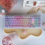 UR98 Spring Kitten Tri-Mode Mechanical Keyboard with whimsical pastel keycaps, showcasing its silent linear switches and tri-mode connectivity.