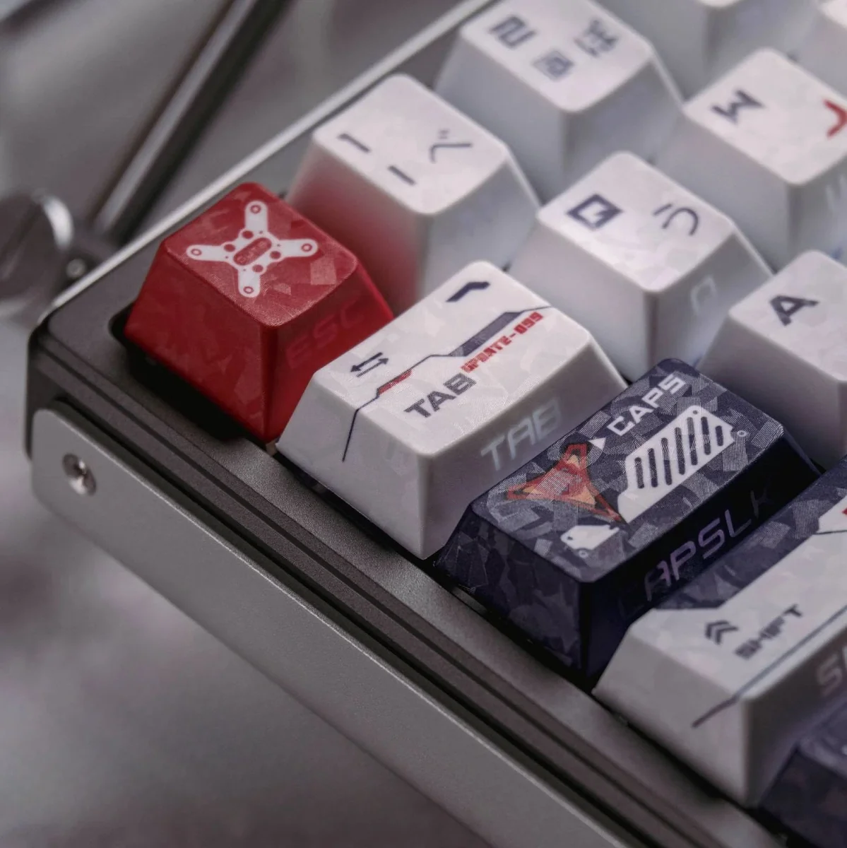 Exclusive Ultraman Tiga GUTS PBT Keycaps. Side-printed, backlit Cherry profile, retro-futuristic carbon fiber legends, displayed from multiple angles.